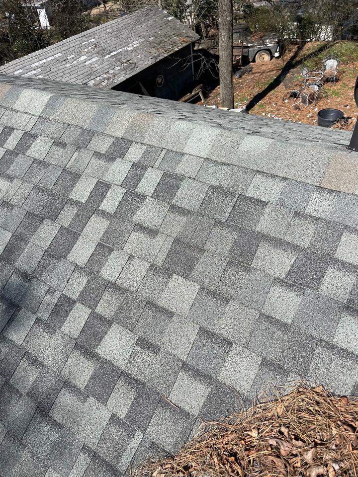 Architectural shingles on a repaired roof section in Saline County AR