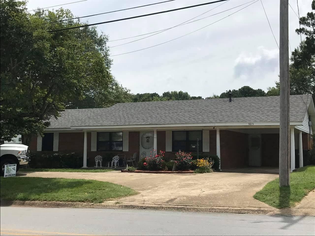 Single-story ranch home in Benton AR after a roof replacement